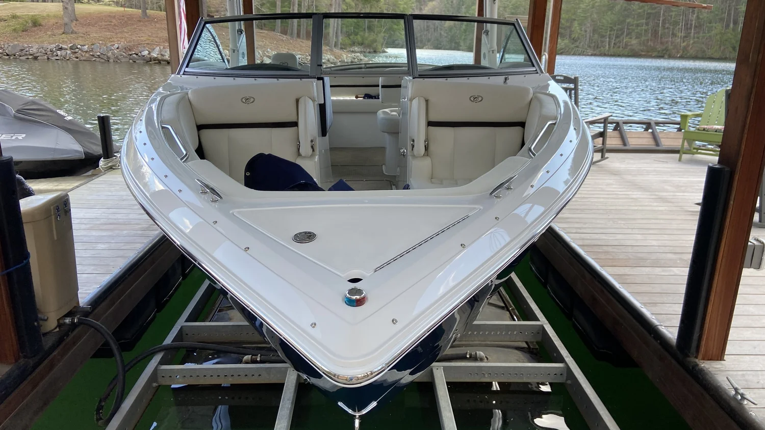 2018 23 foot Cobalt bow view on a covered boat lift at a private dock on Lake Keowee in Sunset SC after marine ceramic coating