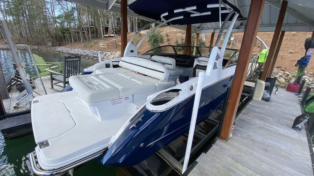 Wide view of boat detailing in progress at a private Lake Keowee dock in Sunset South Carolina