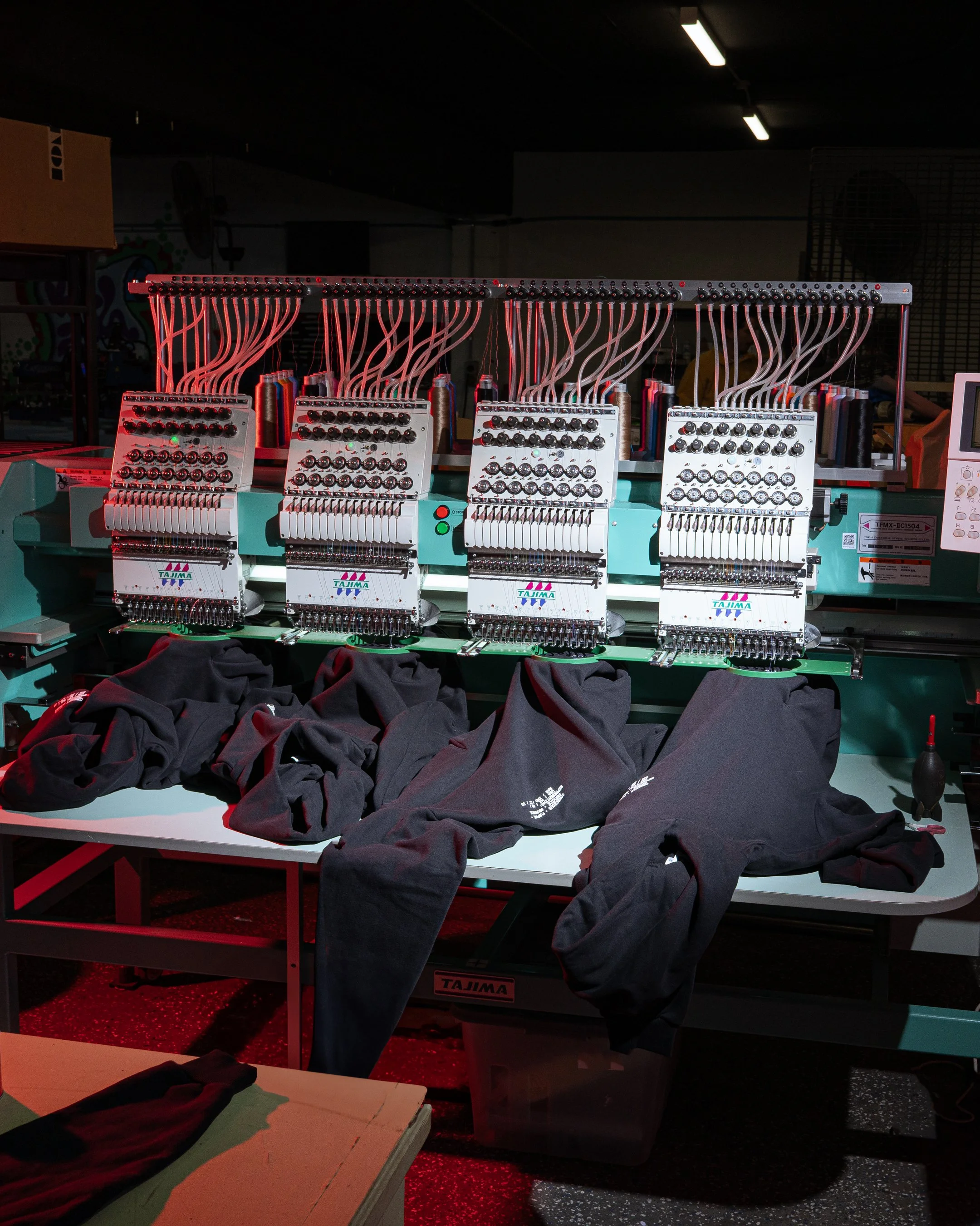 Hoodies being embroidered with high quality custom embroidery
