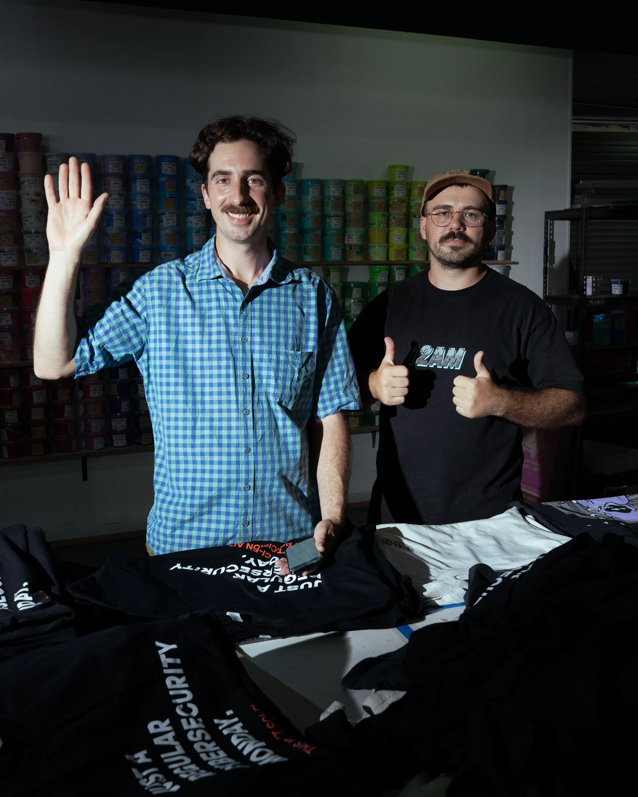Friendly photo of screen printing shop owners