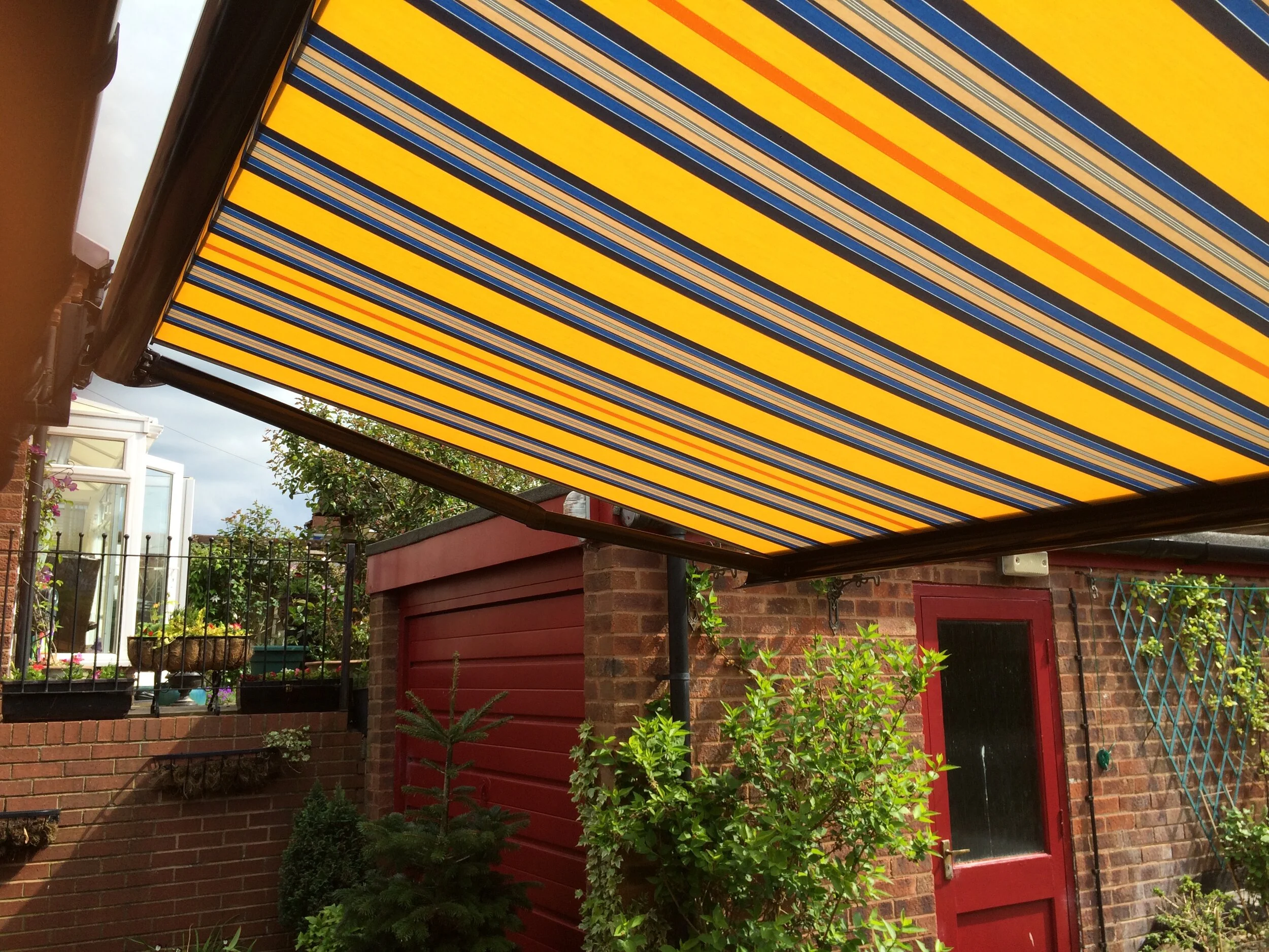Electric Garden Awnings The Perfect Addition to Your Patio Love Your Blinds