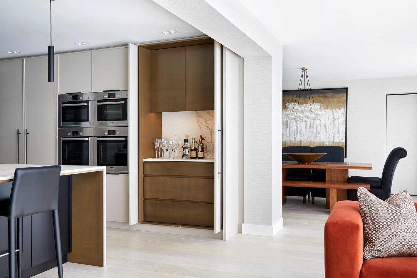 One of our projects from 2022. This pocket door pantry cabinet is a stunning addition to this open plan kitchen and living area. 

Designed by Falchi Interiors.
📸@annastathakiphoto 
.
.
.
#pantrycabinet #bespokekitchen #luxuryhomeinteriors #bespokec