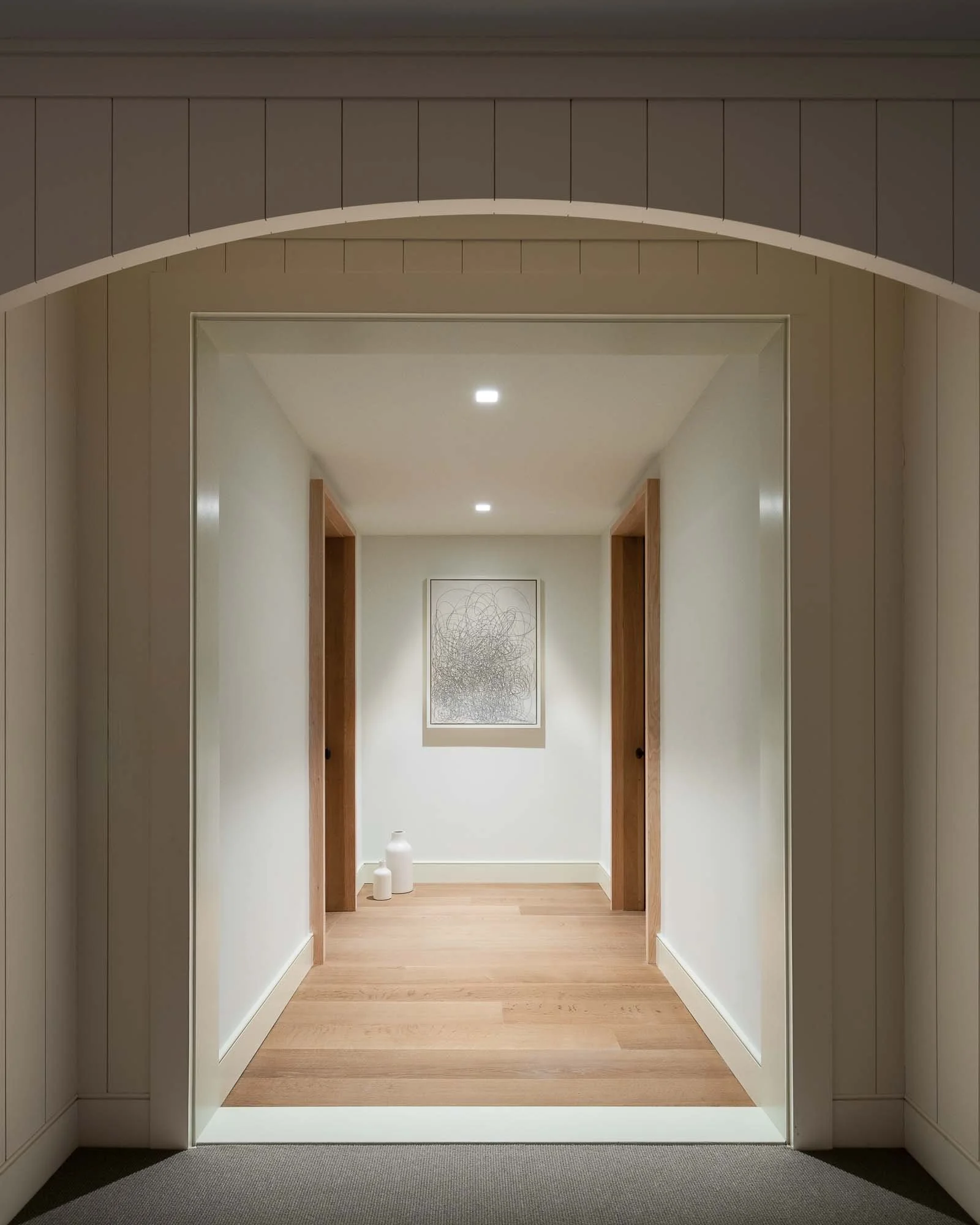 basement hallway with art