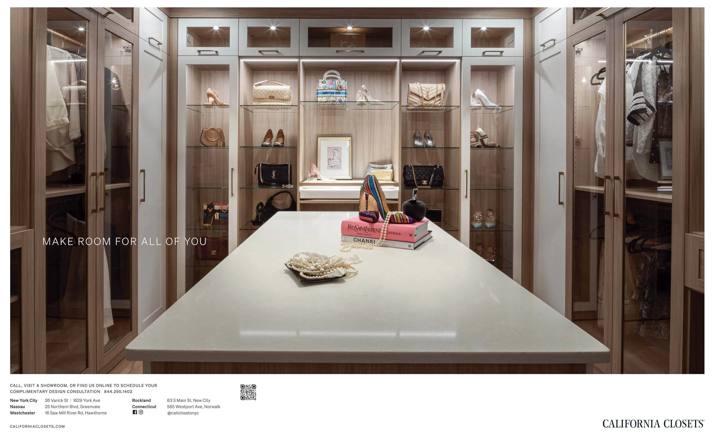 Luxurious walk-in closet with glass-door cabinets, displayed handbags, shoes, and accessories.