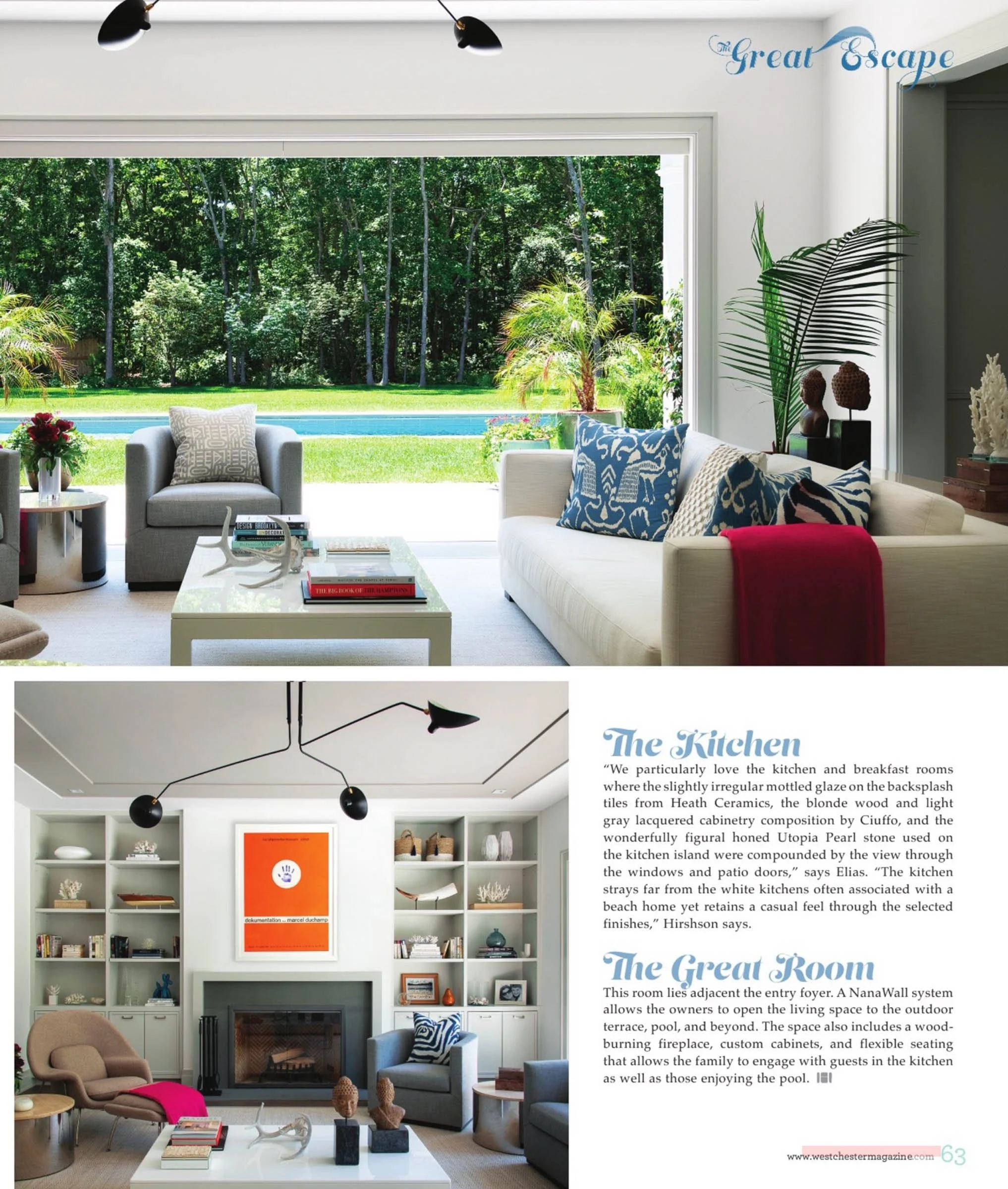 Modern living room with large open sliding doors, revealing a lush backyard with a pool. The room is stylishly decorated with a light beige sofa adorned with vibrant pillows and a red throw blanket. A sleek coffee table is in the center, with books a
