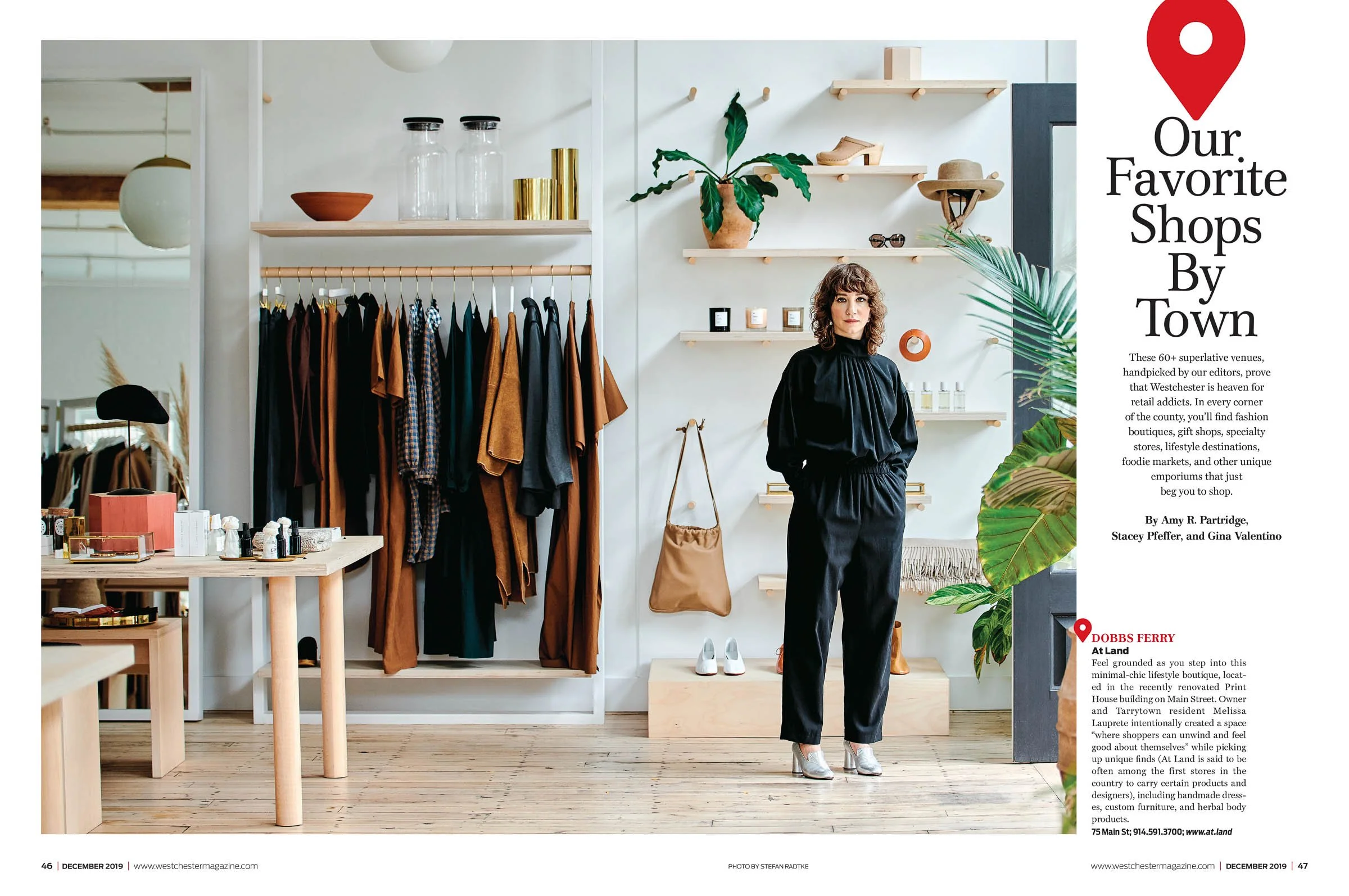 Interior of a stylish boutique with clothing racks featuring earth-toned garments and accessories, modern decor, plants, and shelves displaying various items. A fashionably dressed woman stands to the right. Text on the right reads 'Our Favorite Shop