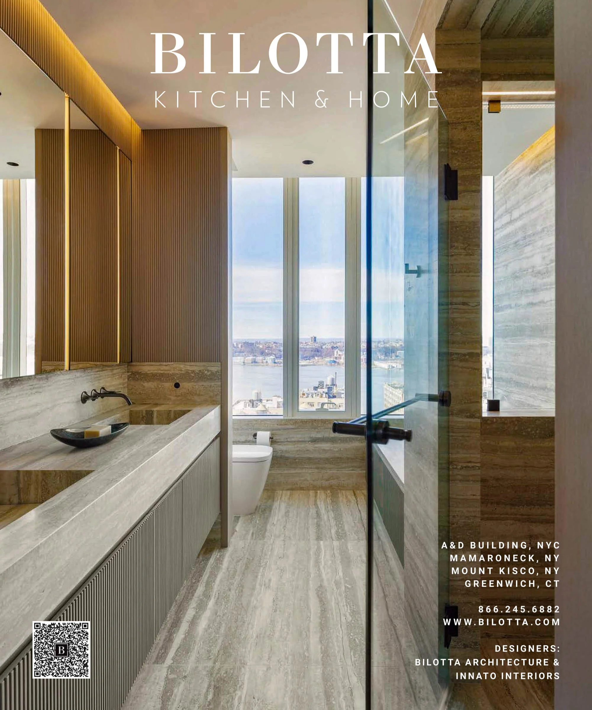 Modern bathroom interior with beige marble tiles, large mirror, vessel sink, and view of a city skyline through windows. Text reads 'Bilotta Kitchen & Home,' with contact and location details.