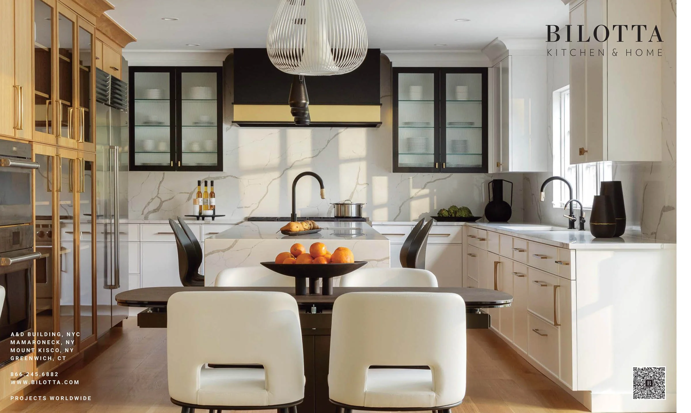 Modern kitchen with marble countertops, wooden cabinets, black and gold accents, a central island with a fruit bowl, and a sleek pendant light. Features stainless steel appliances and minimalistic design.