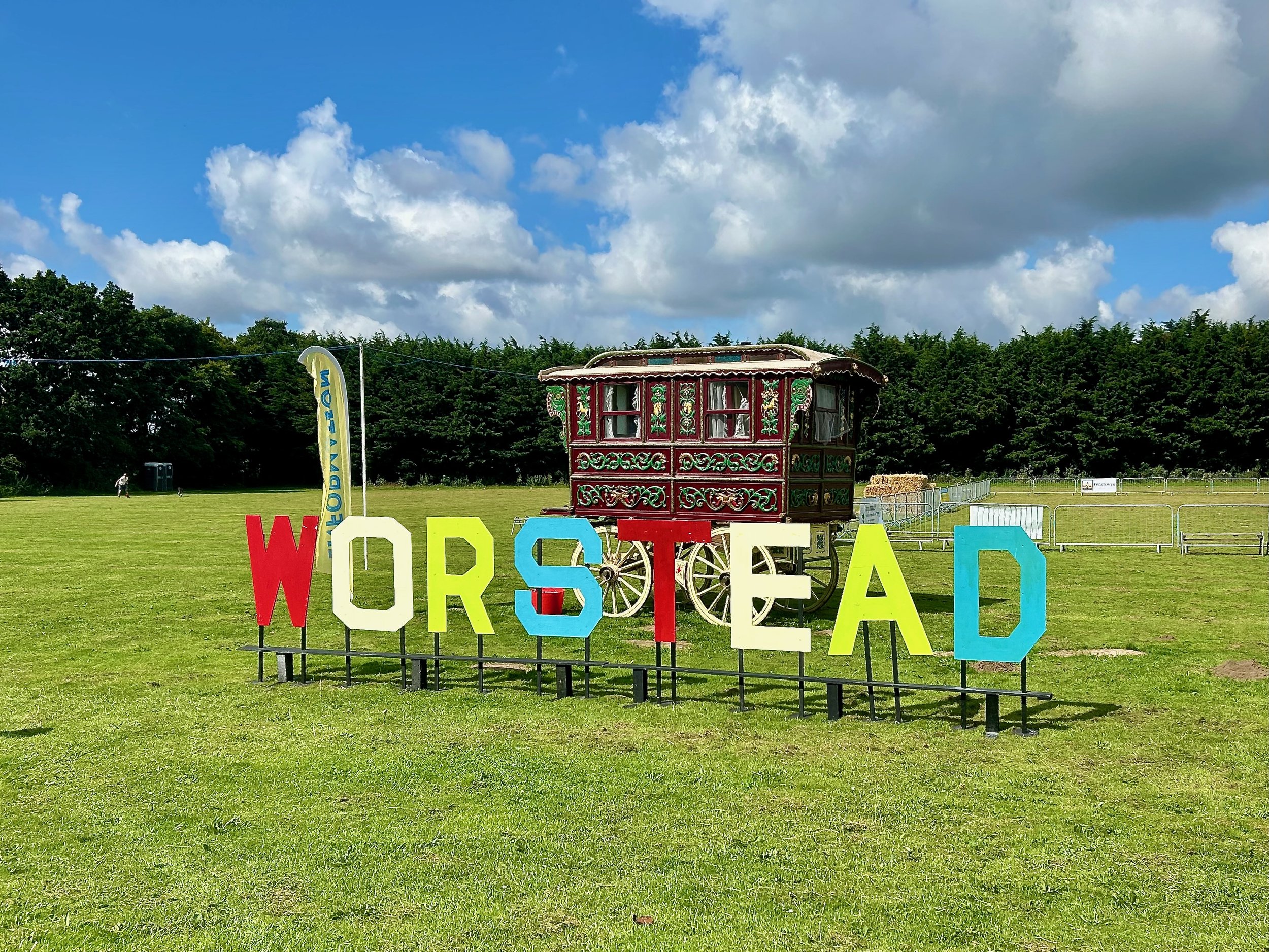 Worstead village coloured lettering sign