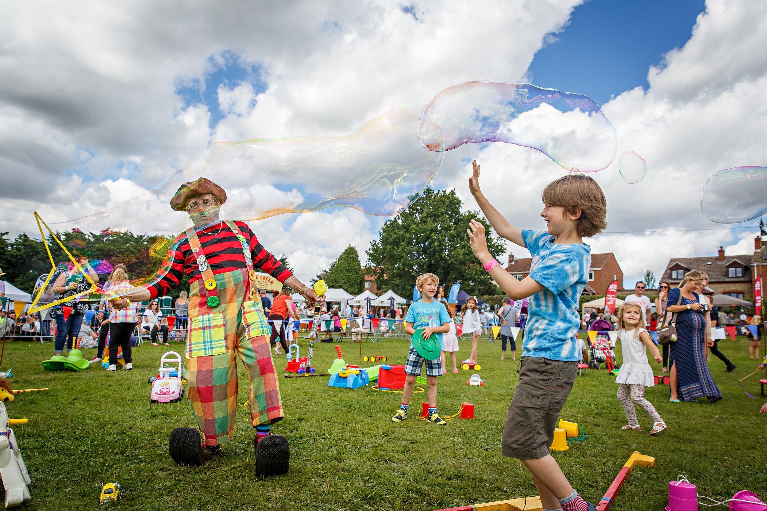 Bubble display with the performer and a young child
