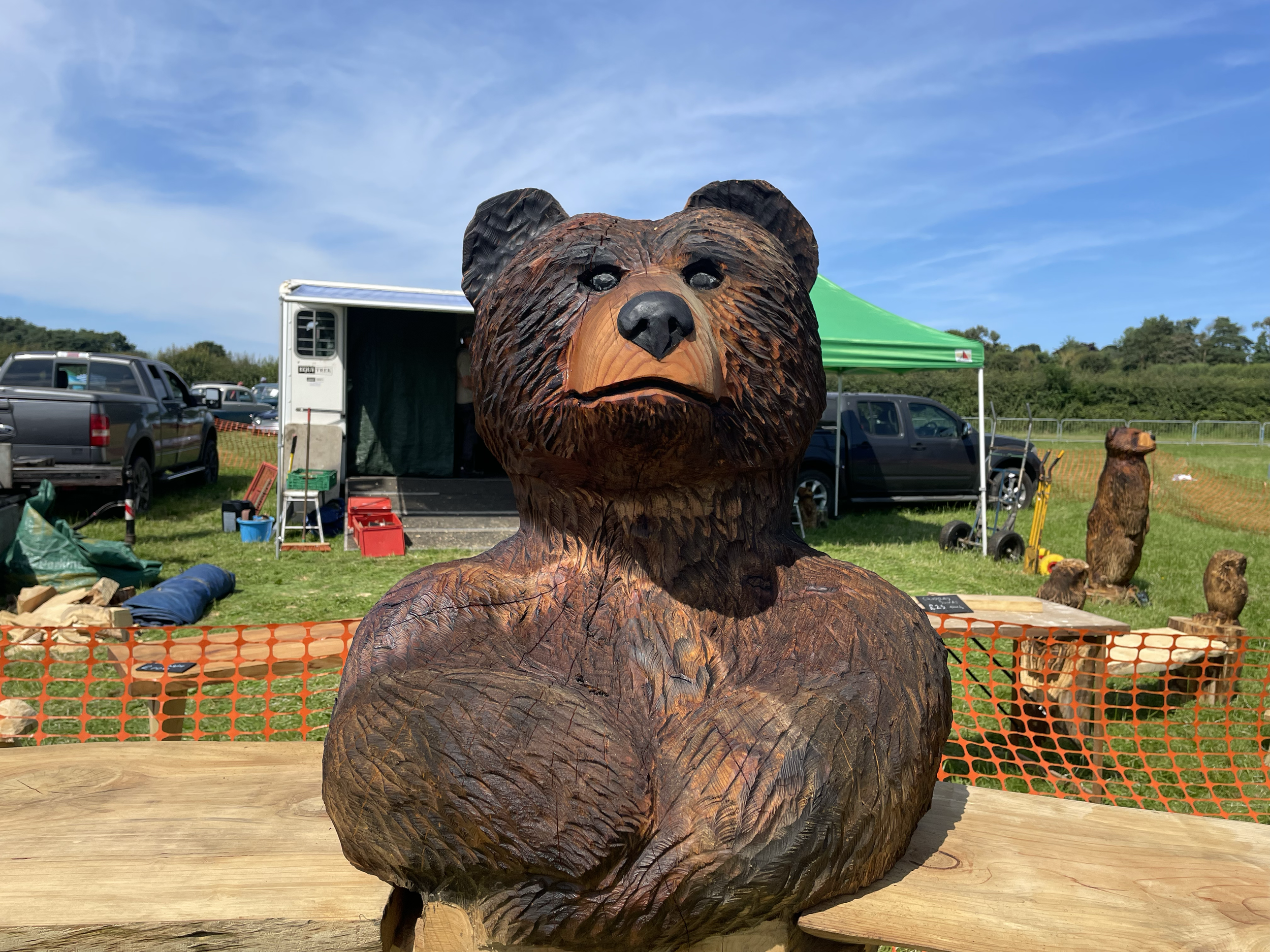 Brown, wooden sculpted bear