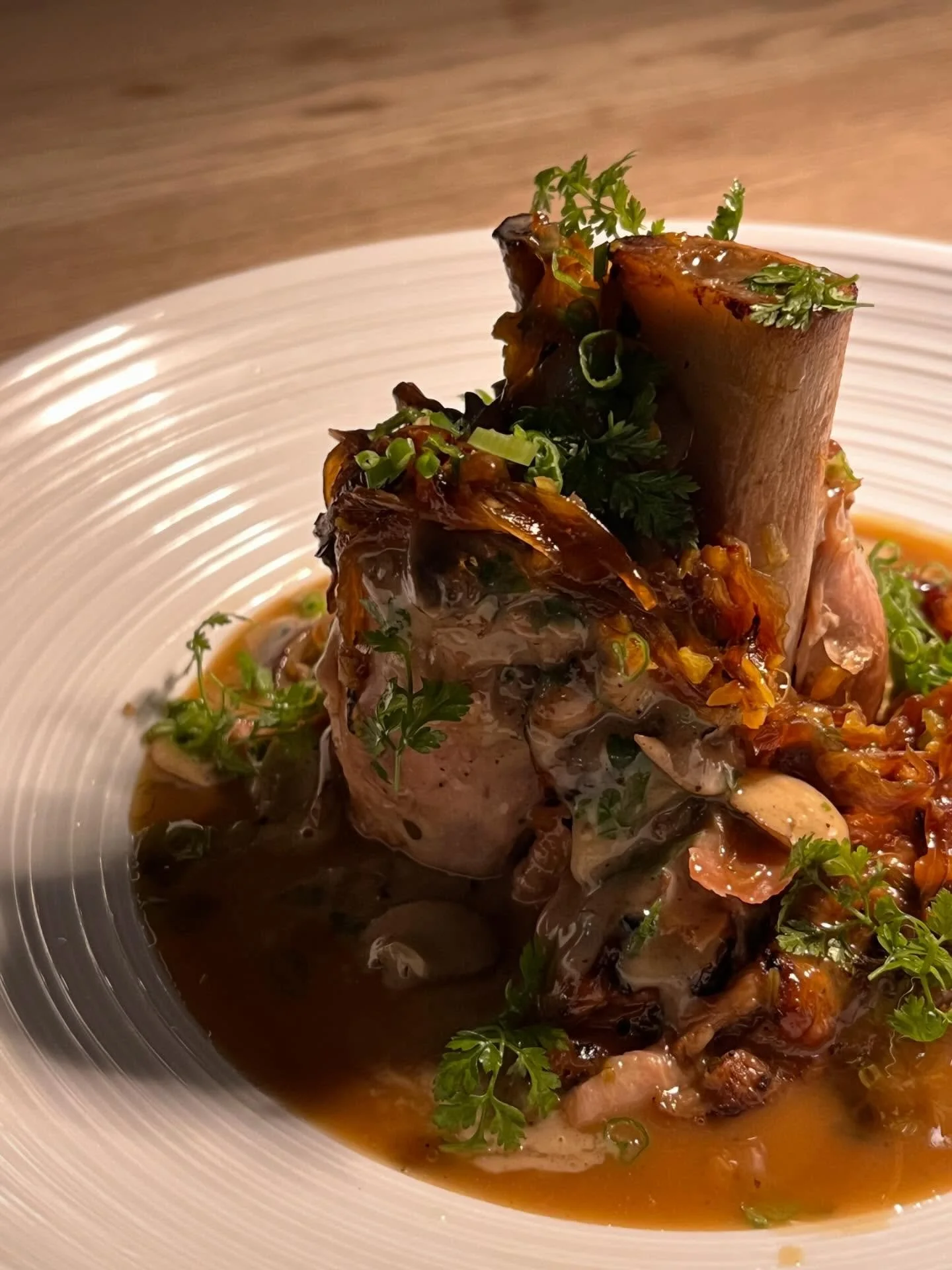 Pork Osso Bucco, mushroom gravy, roasted cherry pepper jam, creamy mashed potatoes, saffron beurre blanc #bostonfoodies #italianfood #ossobucco
