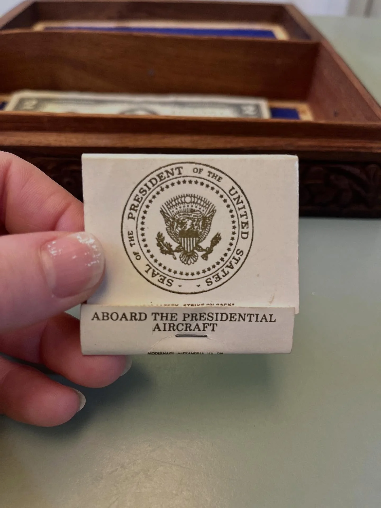 My mother just dropped off a carved wooden box that used to be my dad’s weed box. Inside is a book of matches from Air Force One. My father, who was an Air Force medic in the 70s and 80s, apparently flew on #af1 while it was being transported t