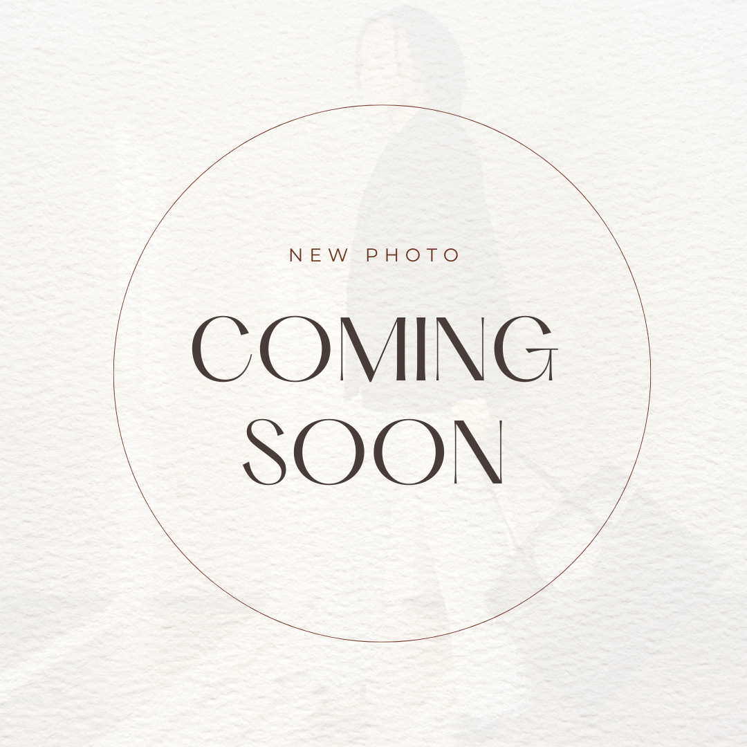 Announcement graphic with a beige textured background, a large circle, and text indicating a new photo coming soon.