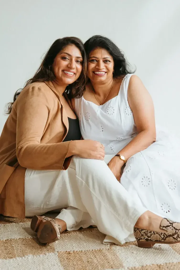 South Asian mother daughter embracing representing family therapy for Gujarati Bengali families in Texas