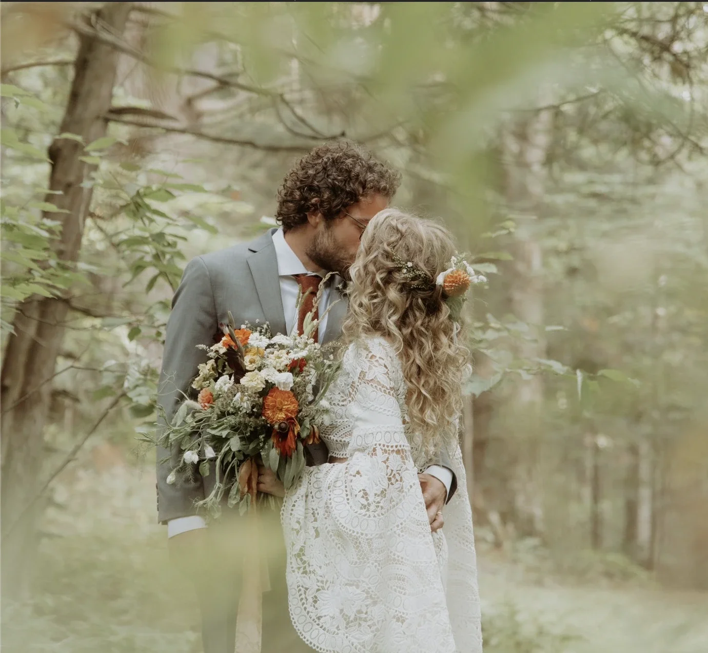 Professional wedding videographer filming couple at ceremony in Sudbury Ontario