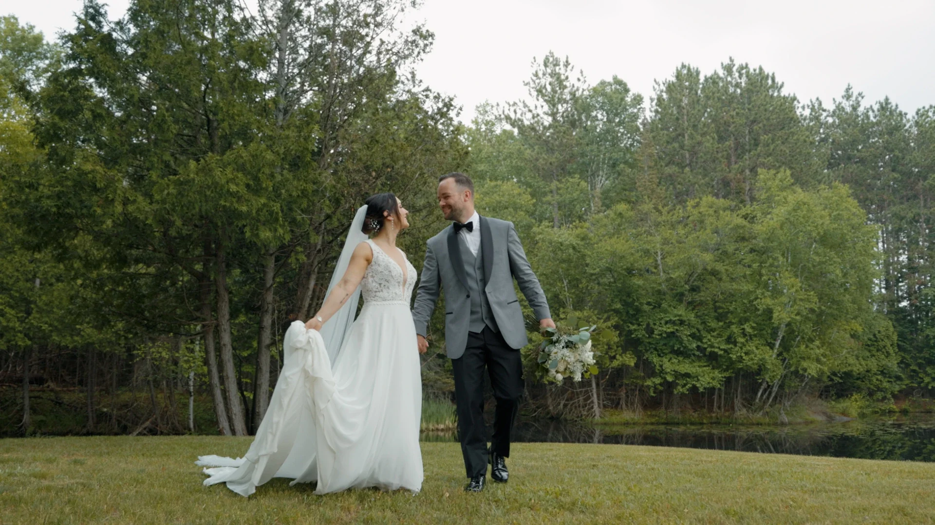Professional videographer capturing ceremony moments at Sudbury wedding venue