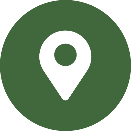 Green location pin icon on a dark green circular background.
