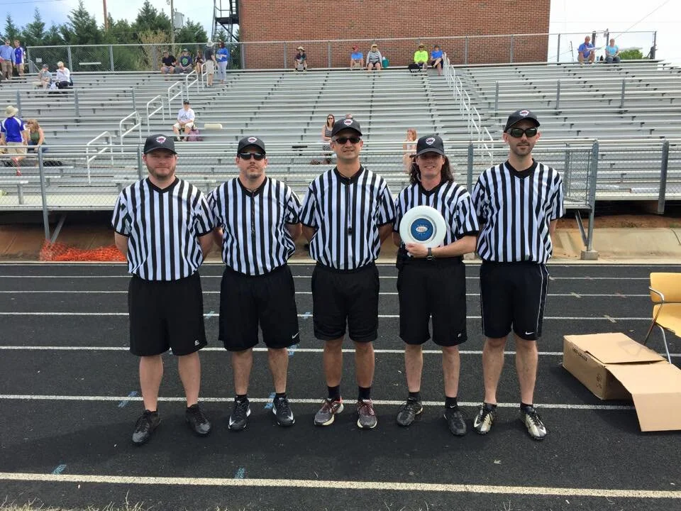 Referee crew for the first season of the Charlotte Express (RIP). Those aren’t high-waisted pants, I have a radio belt on.