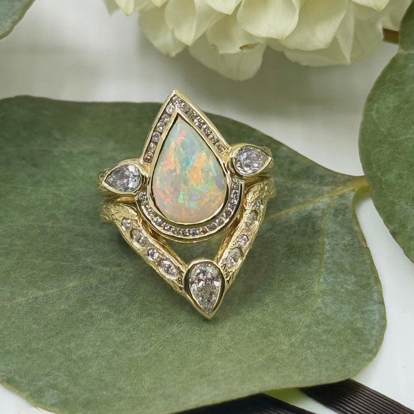 Many months of love &amp; creativity went into designing this gorgeous Opal engagement ring for the most stunning bride to be 💍 Huge Congrats Jenn &amp; @itstroyedwards ✨ Your love is pure MAGIC 🫧

🫶🏼💐🫶🏼💐🫶🏼💐

#teeniejewelry #customengageme