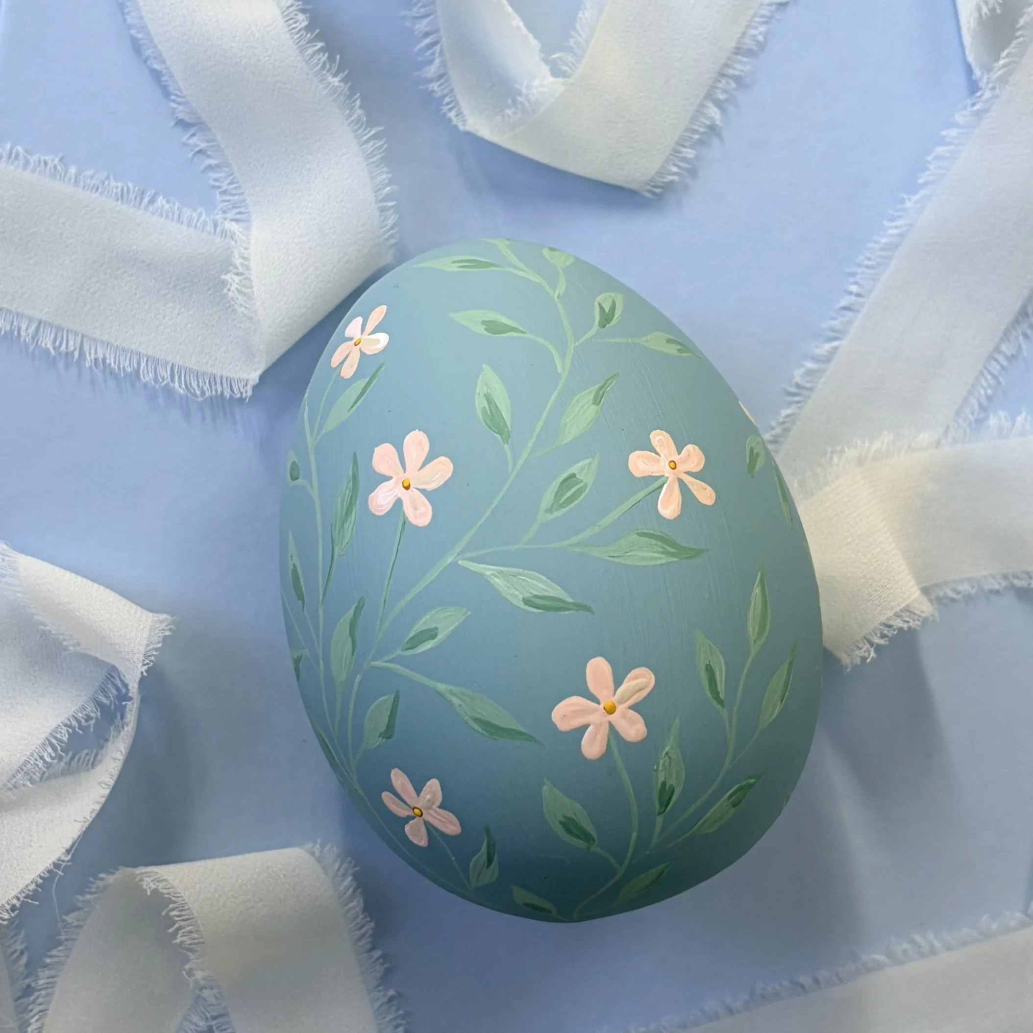 pink on blue easter egg