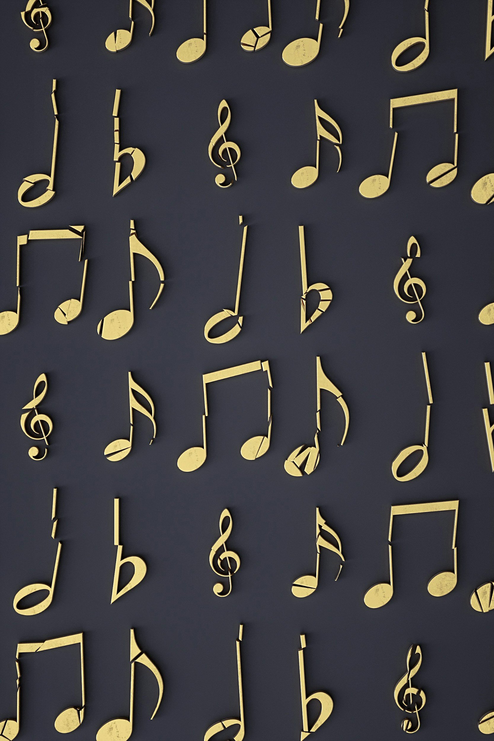 Golden musical notes and symbols arranged against a dark background.