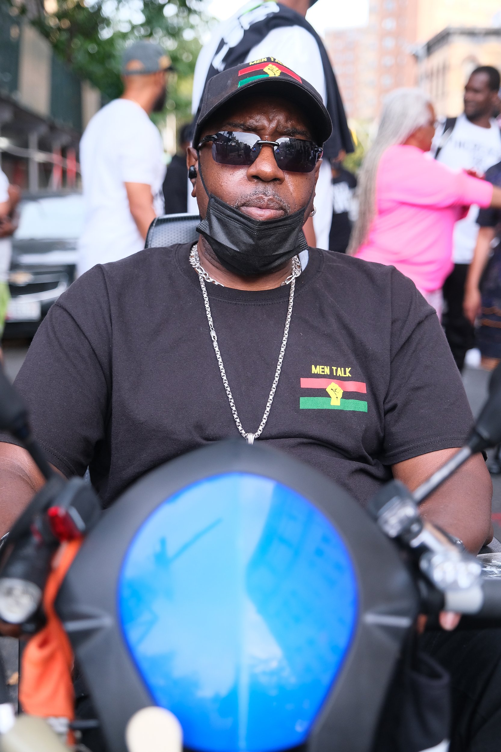 A man participates in an anti-gun violence march in Bed-Stuy Brooklyn. The march was organized in response to the August 17th mass shooting that occured at the Eleanor Roosevelt houses.  