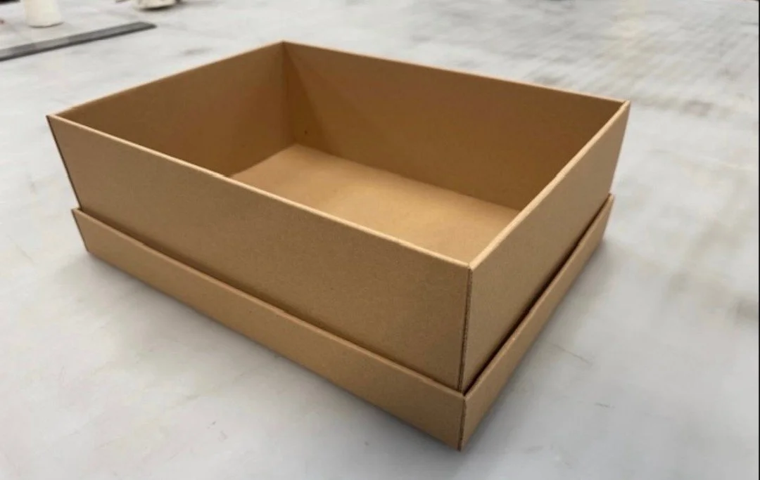 This high-end shoe box sample is made from corrugated, giving you the durability of a shipping box with the clean, structured look of a premium retail package. Custom printed or kept natural, this is the kind of packaging that makes your product feel