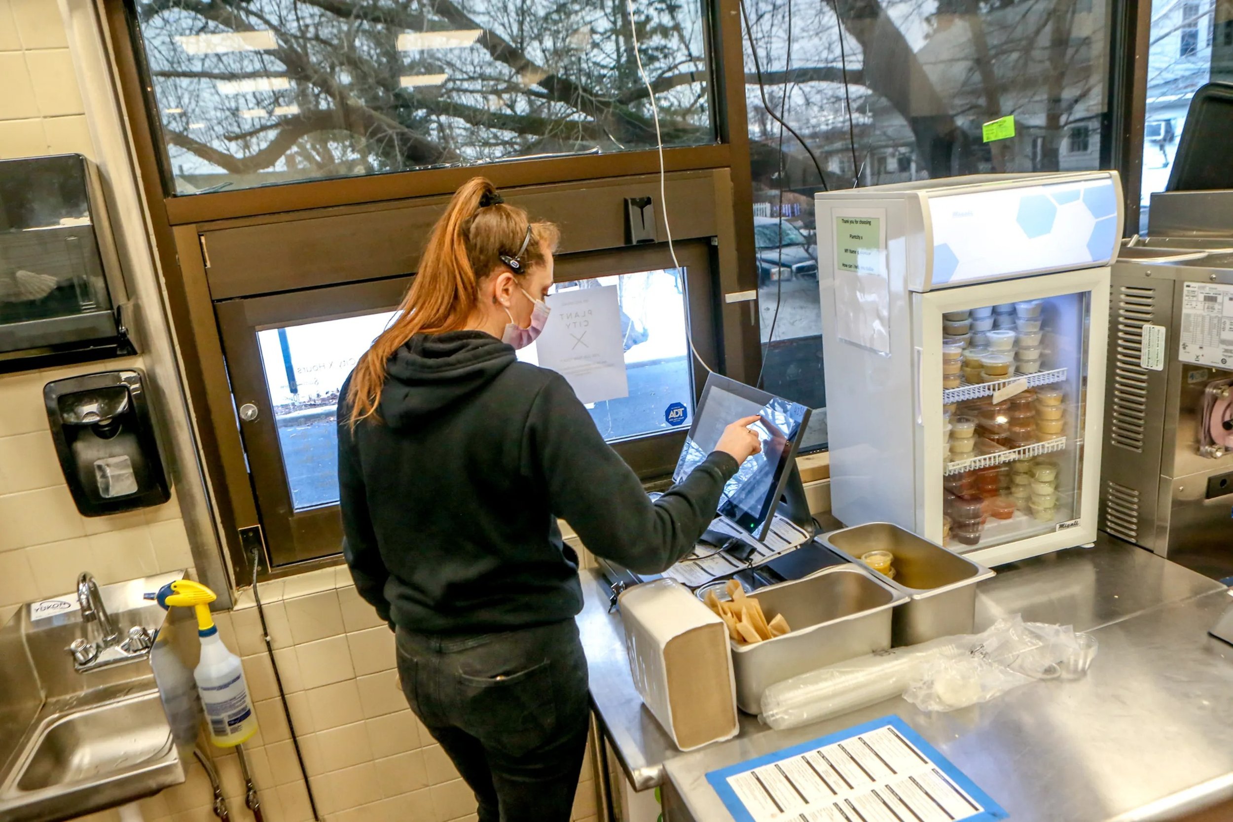  Customers can order at the counter and eat inside the dining room. Or they can order and pick up at the drive-thru window. Photo credit David DelPoio, The Providence Journal 