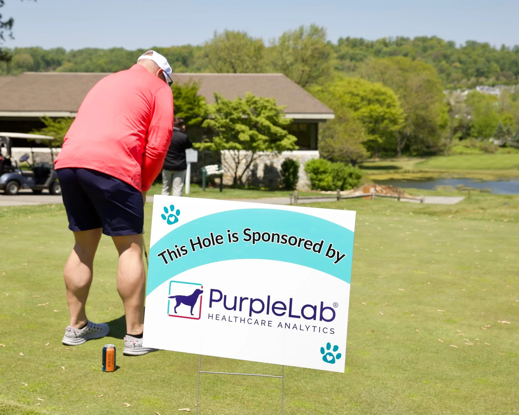 putts-for-pups-event-photos-gallery-Putts for Pups 14 - Purple Lab.jpg