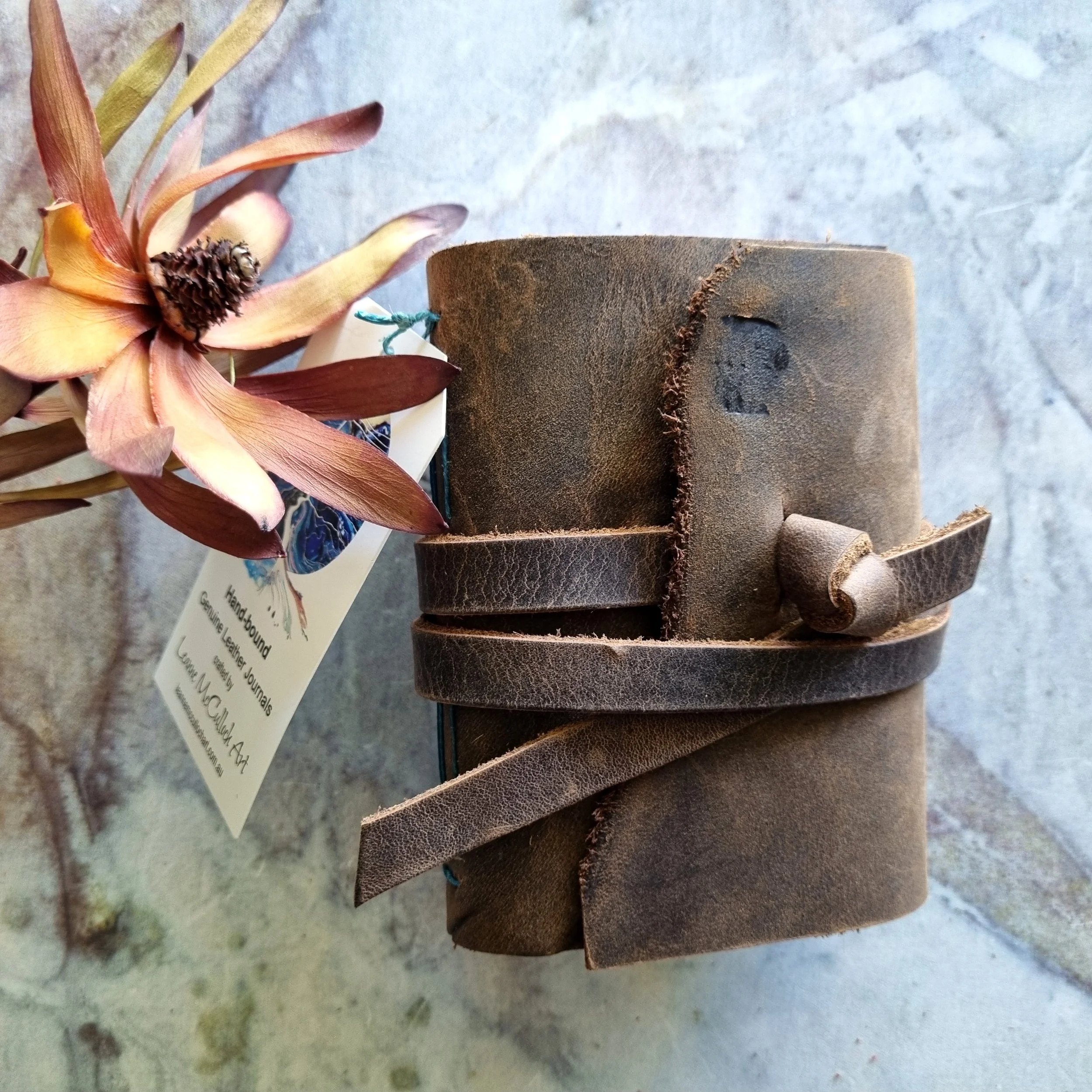 A7 Brown Leather Foldover Front Journal - blue stitch