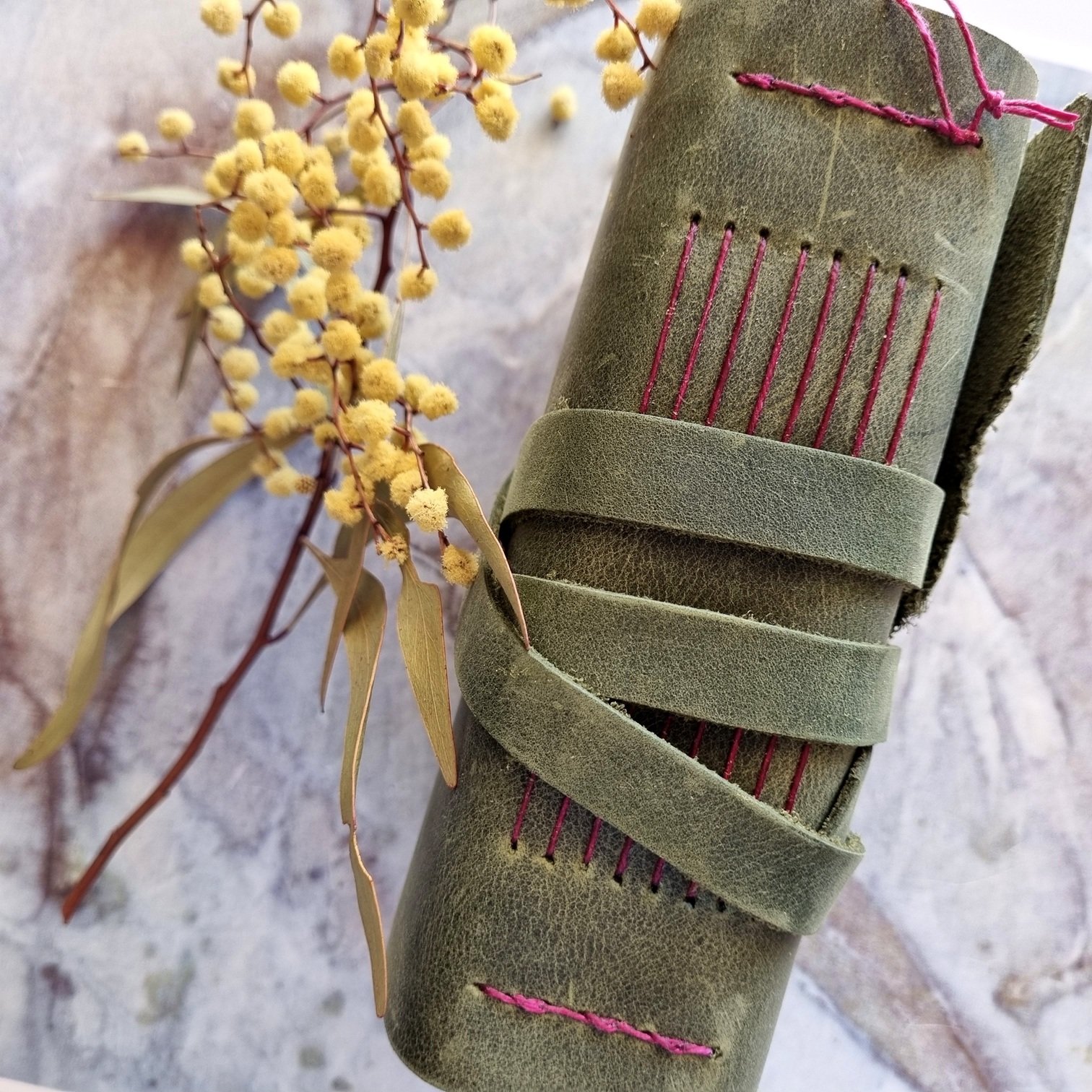 a6 olive stitching.jpg
