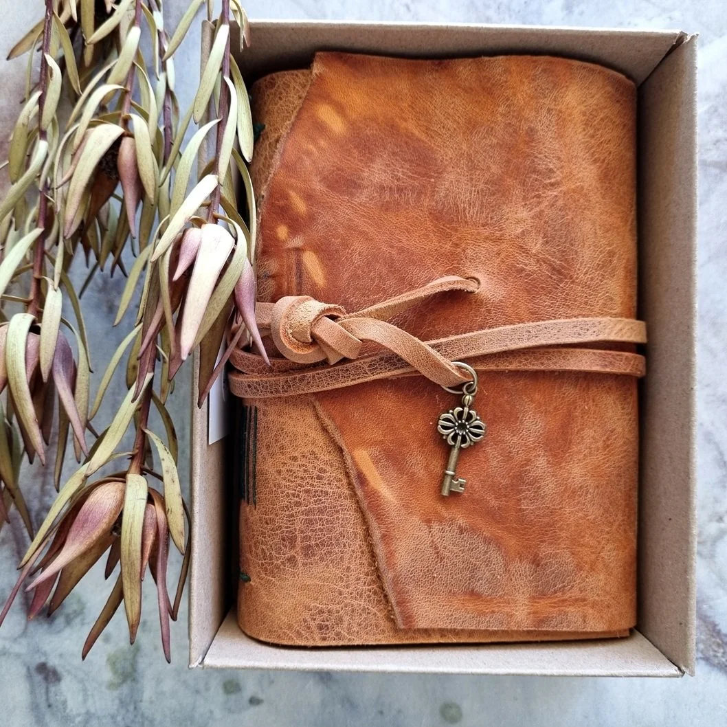 A6 Tan Foldover Leather Journal - emerald stitch