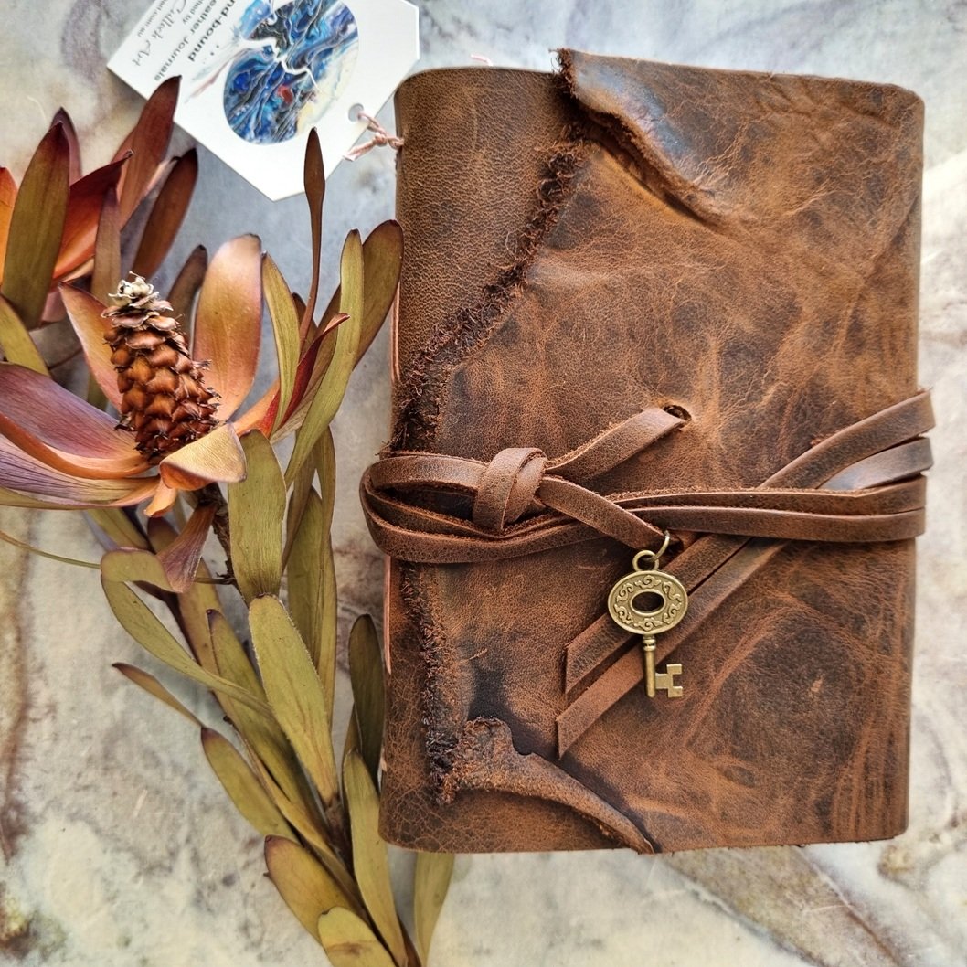 A6 Brown Foldover Leather Journal - dusky pink stitch