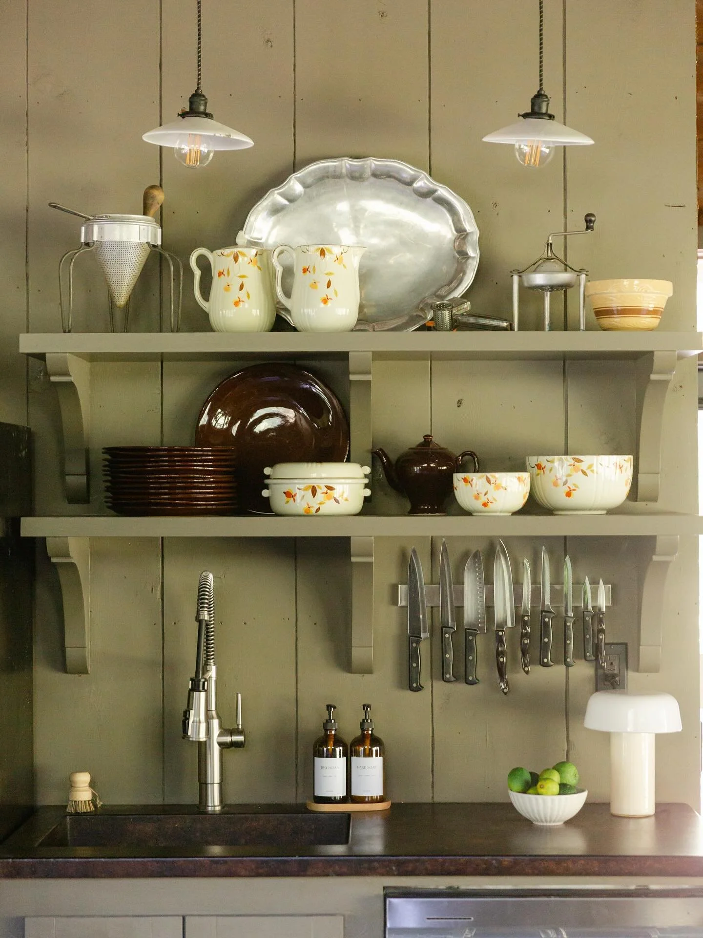 Something old for The Rock Cabin. Loved mixing in all that vintage pottery and silver.