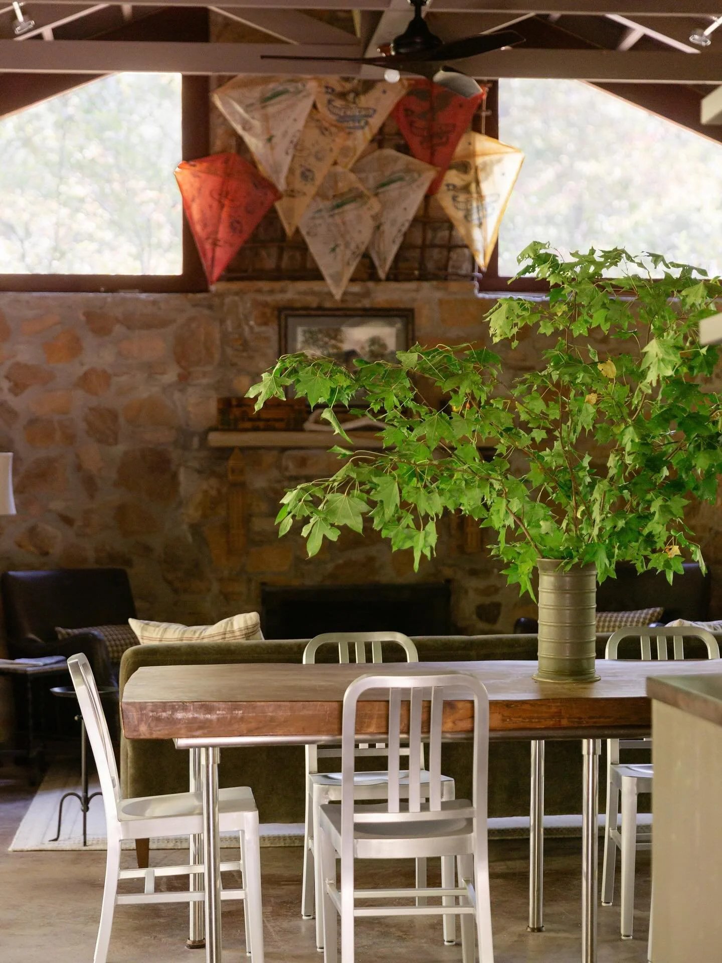 The vintage kites above the fireplace 😍