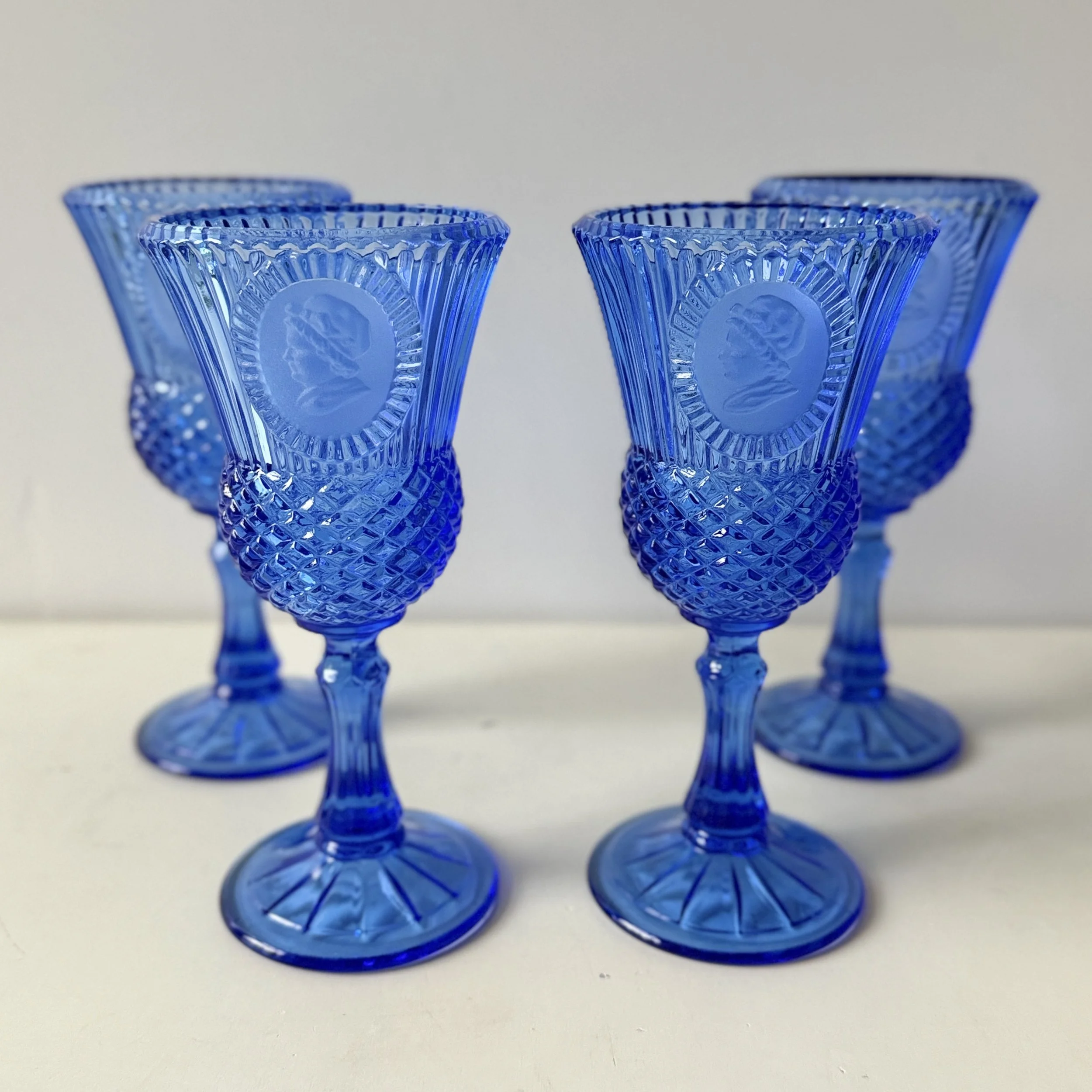 Set of 4 Vintage 1970s Cobalt Blue Glass Goblets feat. Frosted Cameo Portrait of Martha Washington, by Fostoria Glass Co. for Avon