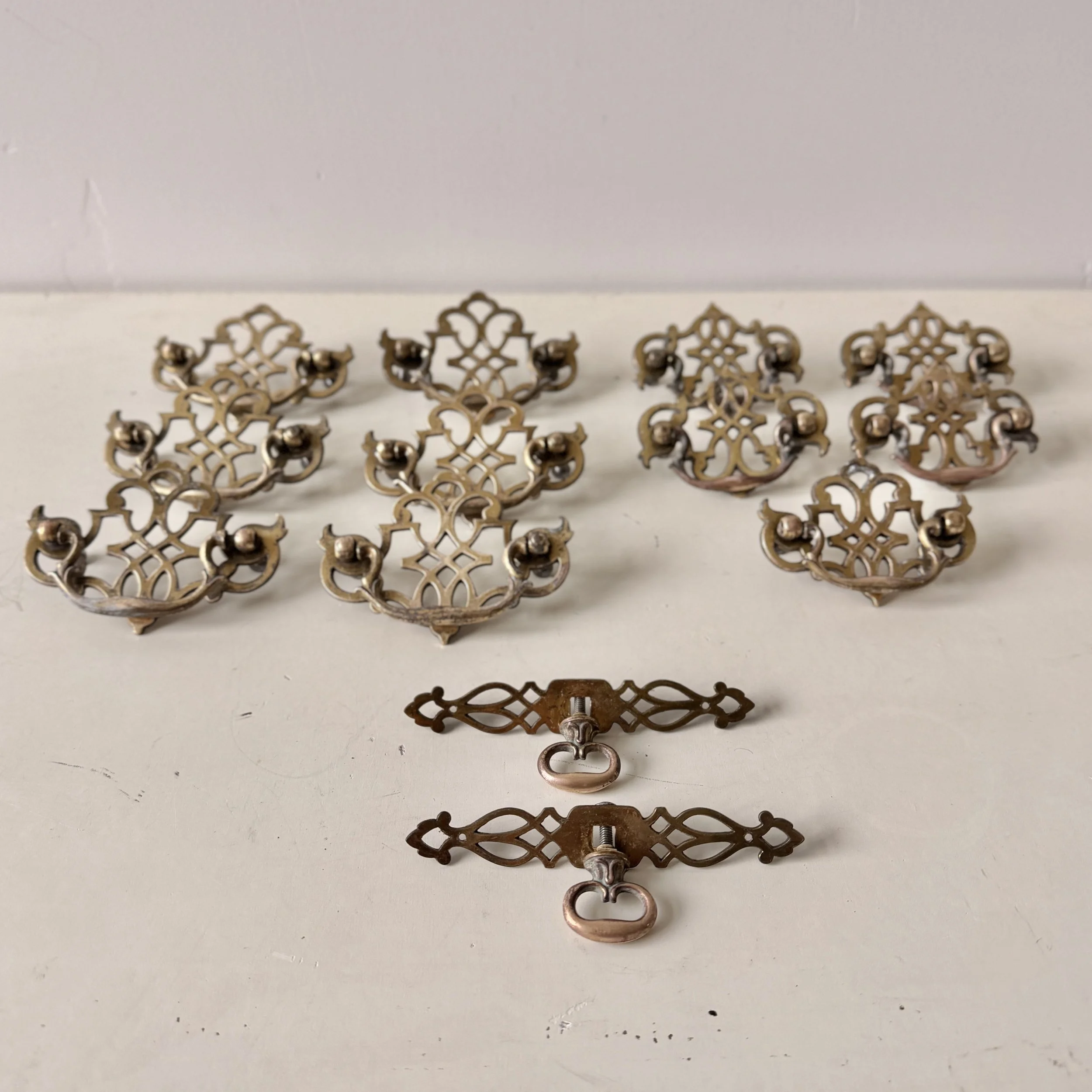 13-Piece Set of Vintage Brass Drawer Pulls