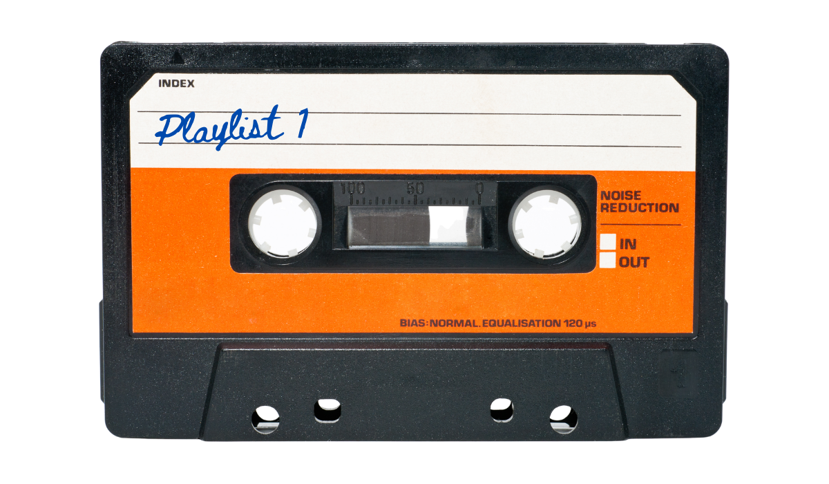 vintage orange cassette tape labelled "Playlist 1"