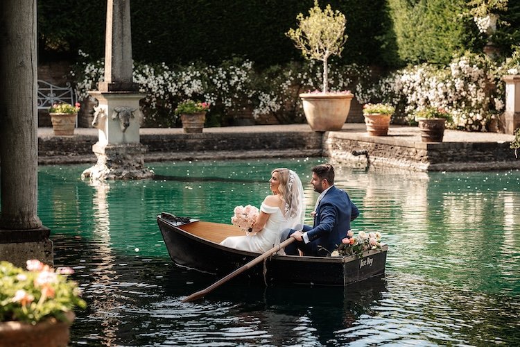 a couple sat in a rowing boat at euridge manor