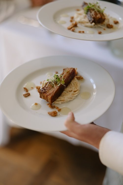Wild Fork's dinner party catering with pork belly and celeriac remoulade