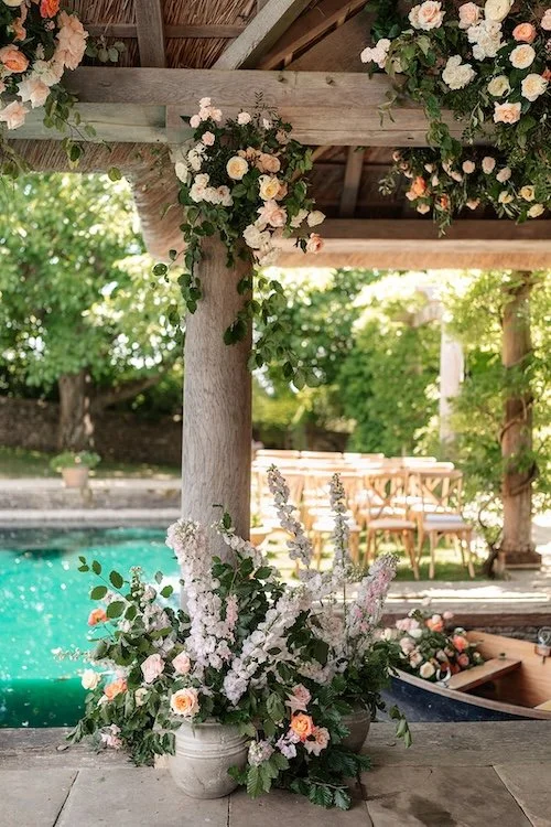 the boat house at euridge manor decorated with flowers