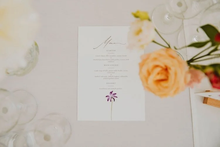wild fork's wedding menu with a wild flower