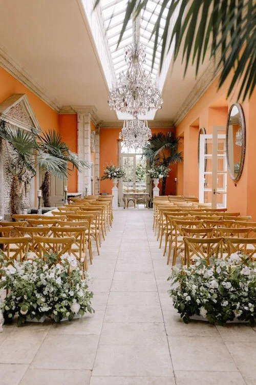 the orangery at euridge manor ready for a wedding ceremony