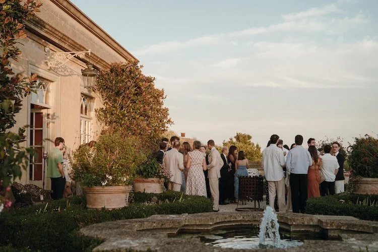 guests enjoying a wedding reception on the terrace at Euridge Manor