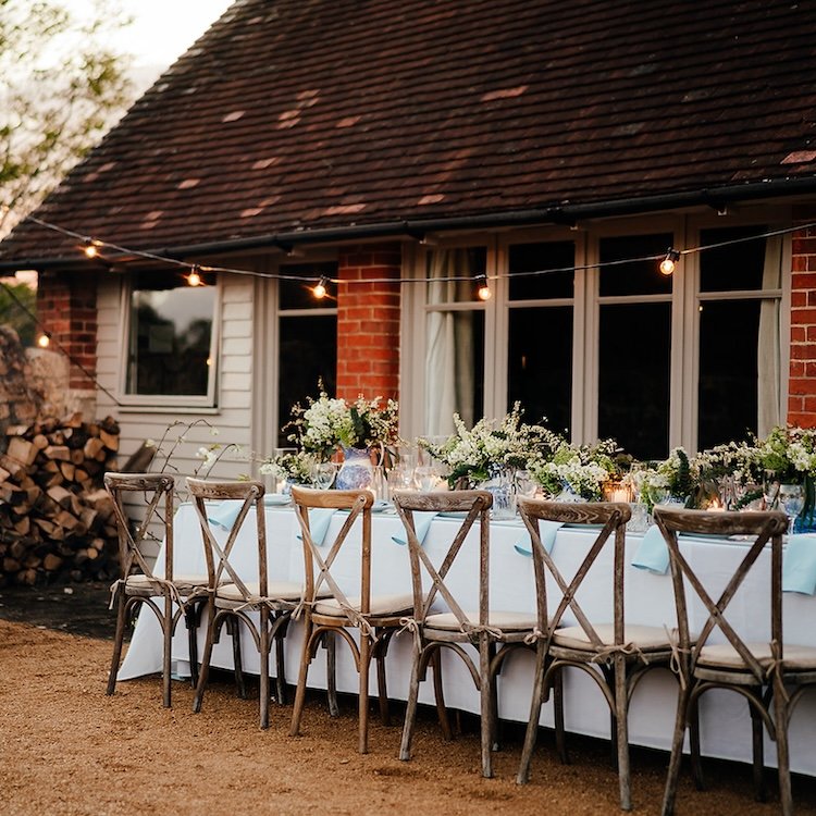 Intimate wedding venue with a long table set up for communal style dining