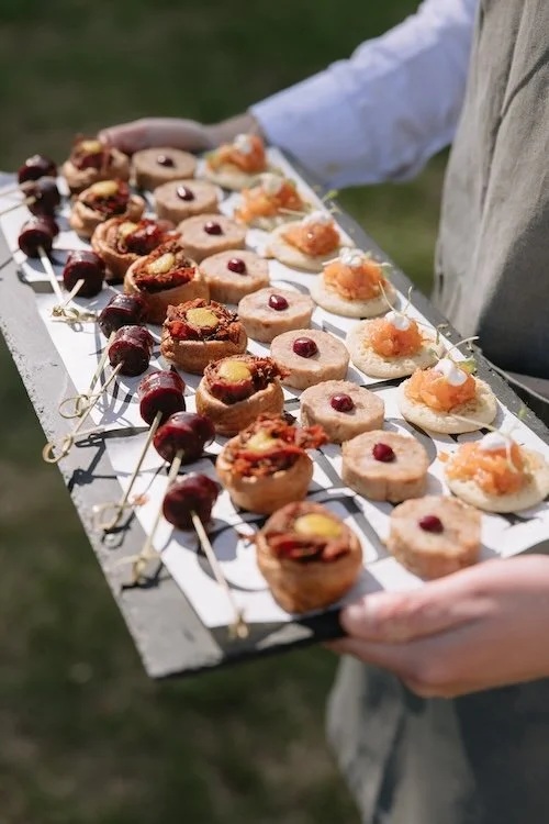 Wild Fork's canapés being circulated on a tray by waiting staff
