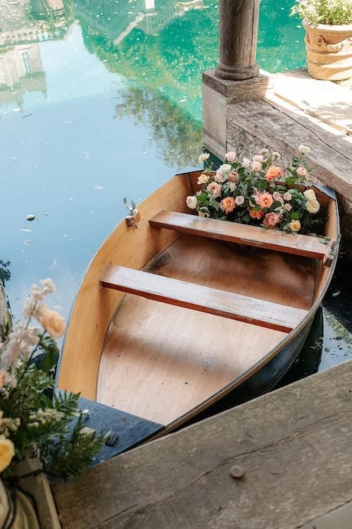 a rowing boat decorated with flowers at euridge manor