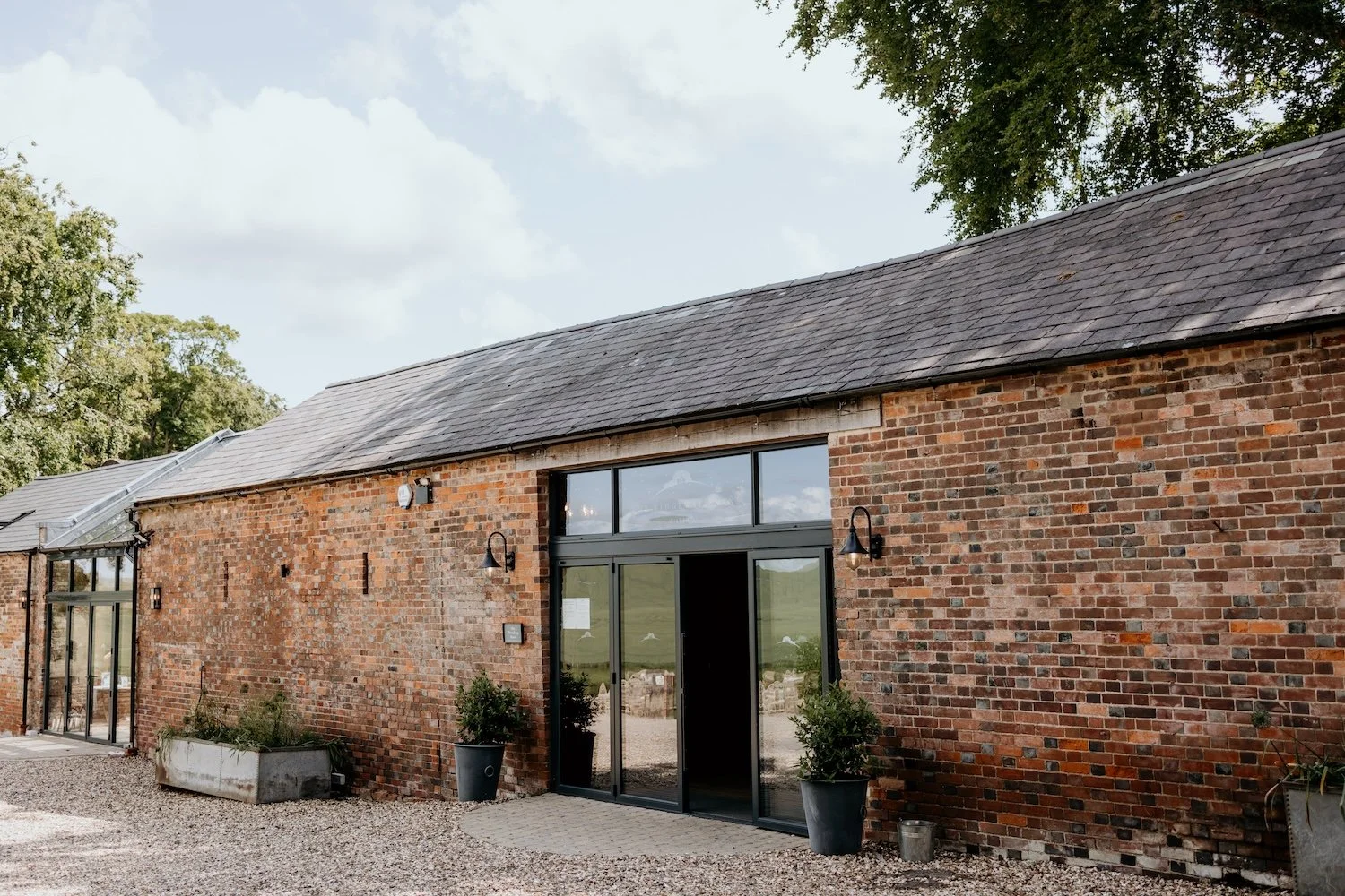 Exterior shot of a Christmas Party Venue called Ridgeway Barns