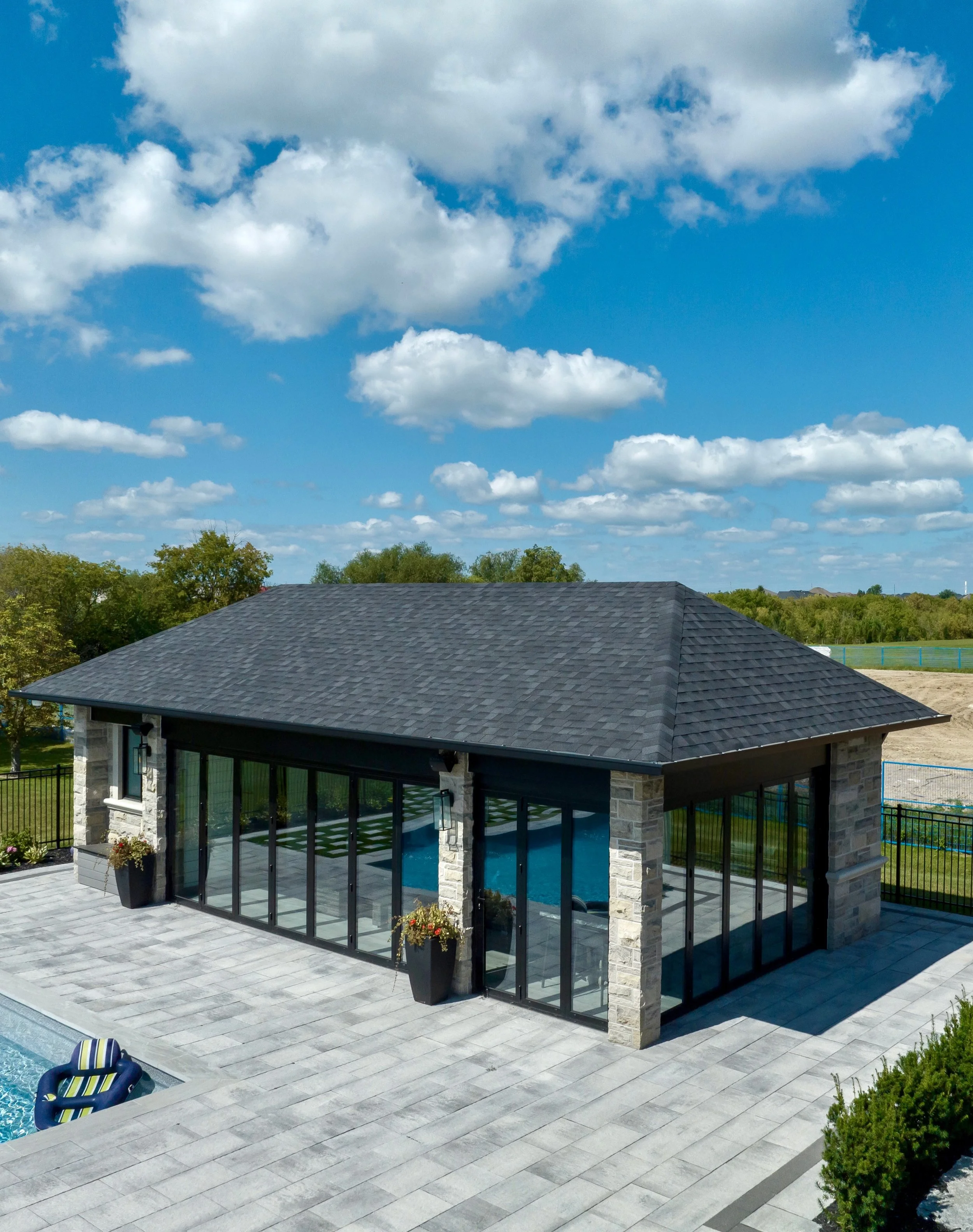 Part of a recently completed project in Brampton, this custom cabana was introduced alongside an extensive landscape scope to complement the main residence.

Designed, permitted, and built under our management, with the same attention to detail carri